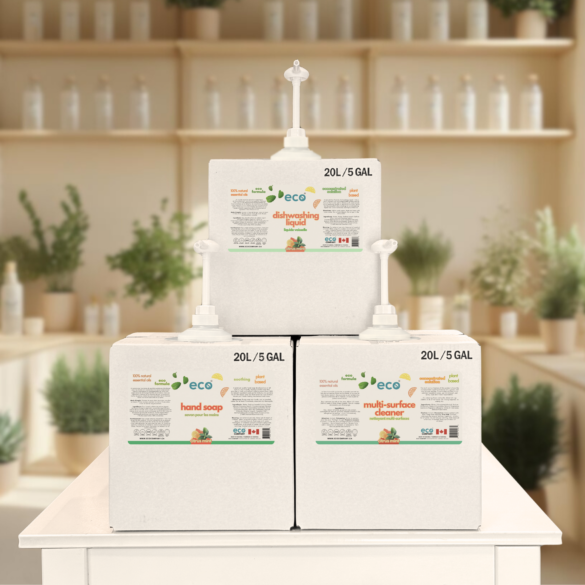 Refill station of refill boxes containing dish soap, hand soap, and multi-surface cleaner all in the citrus mint scent.