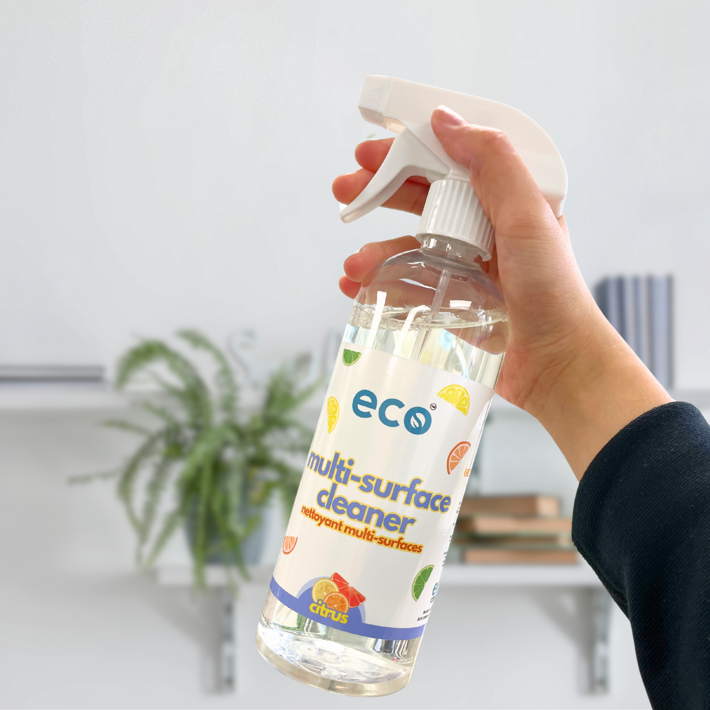 A bottle of eco all-purpose cleaner in citrus, for a plant-based and eco-friendly cleaning routine.