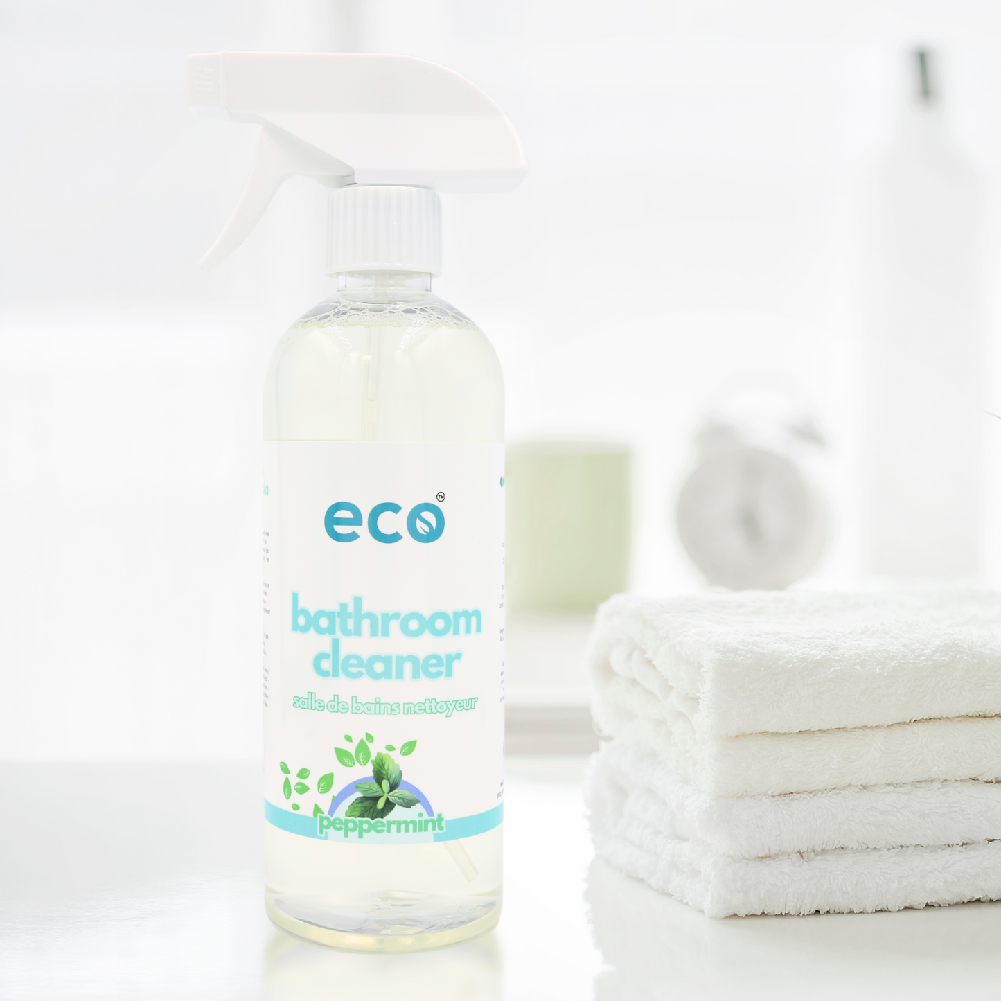 A bottle of eco bathroom cleaner on a counter, for a sustainable and eco-friendly home.