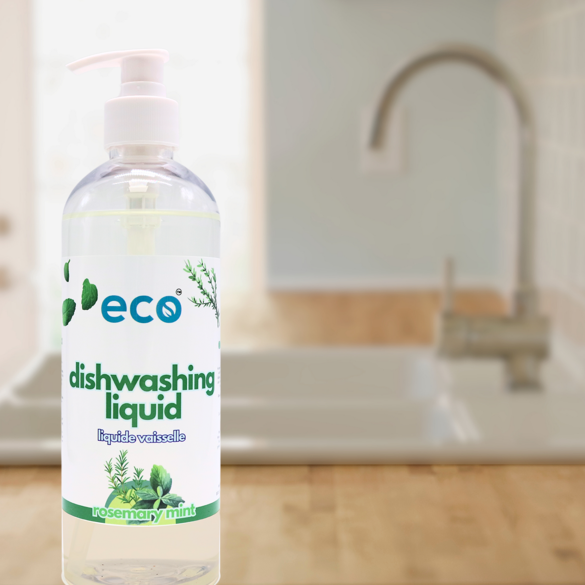 A bottle of eco dish soap rosemary mint by the kitchen sink, for an eco-friendly and sustainable home.