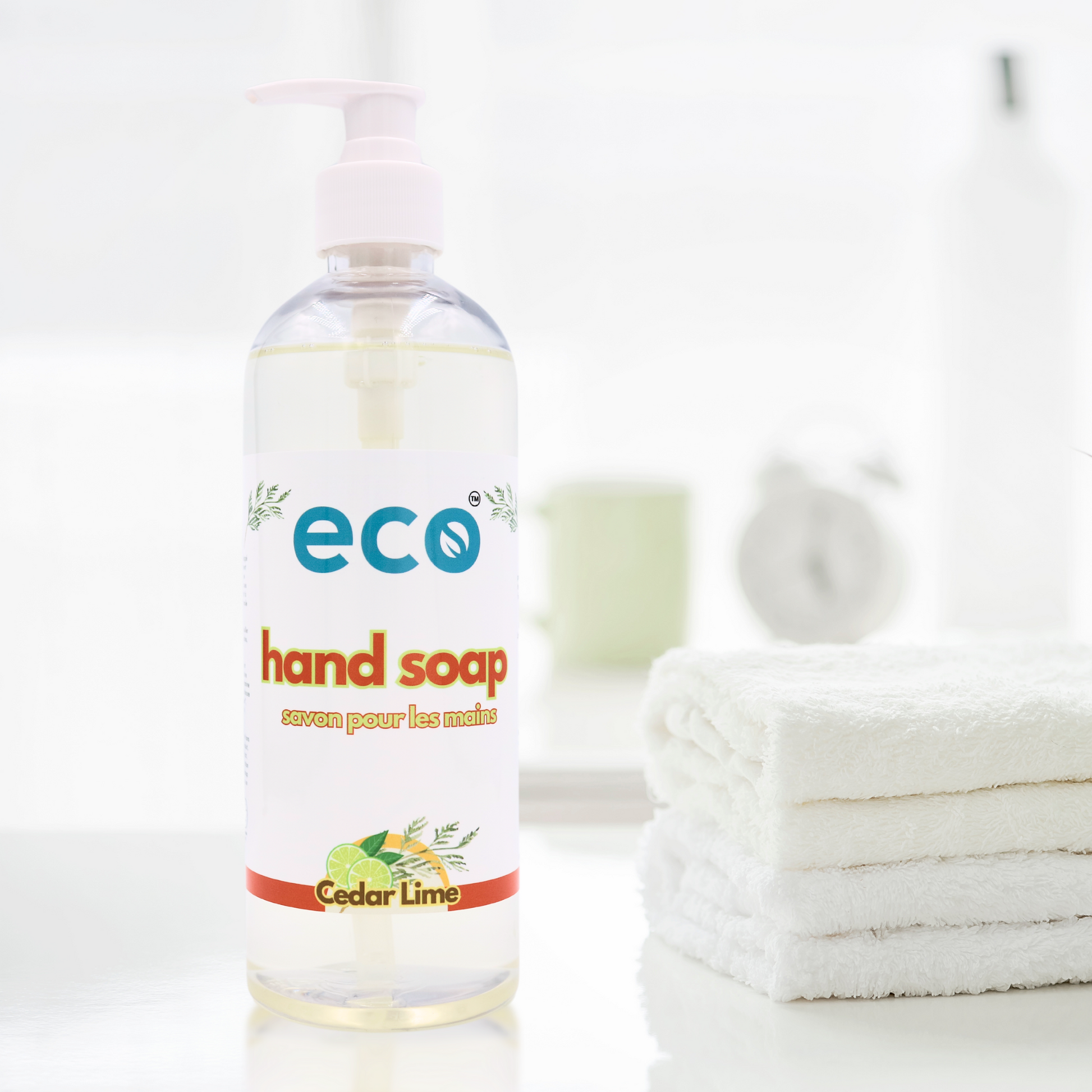 A bottle of eco hand soap in cedar lime on the bathroom counter, for a sustainable and eco-friendly home.