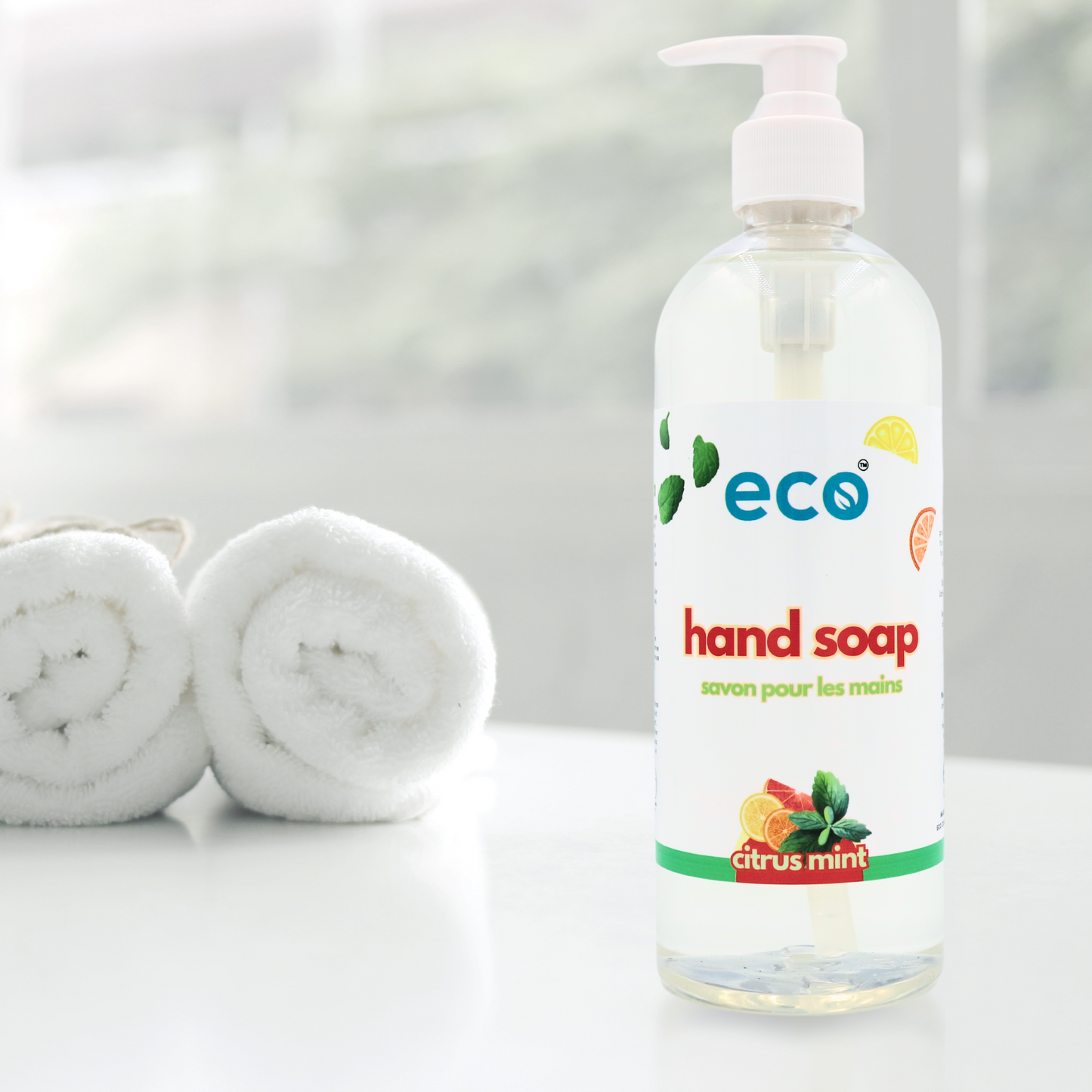 Natural plant-based hand soap bottle in a washroom, promoting sustainable living and green habits.