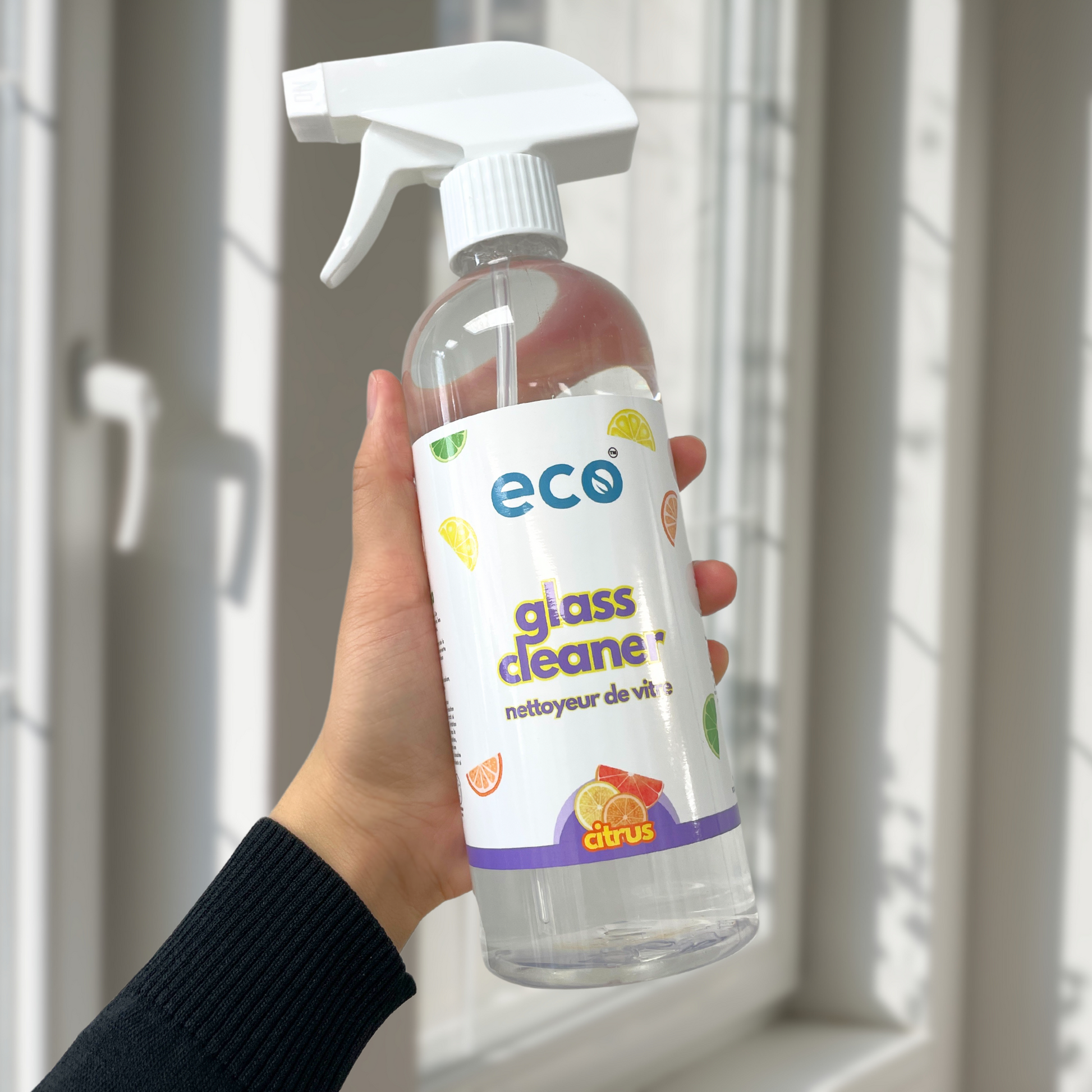 Eco-friendly glass cleaner in citrus, for sustainable home cleaning and green living.