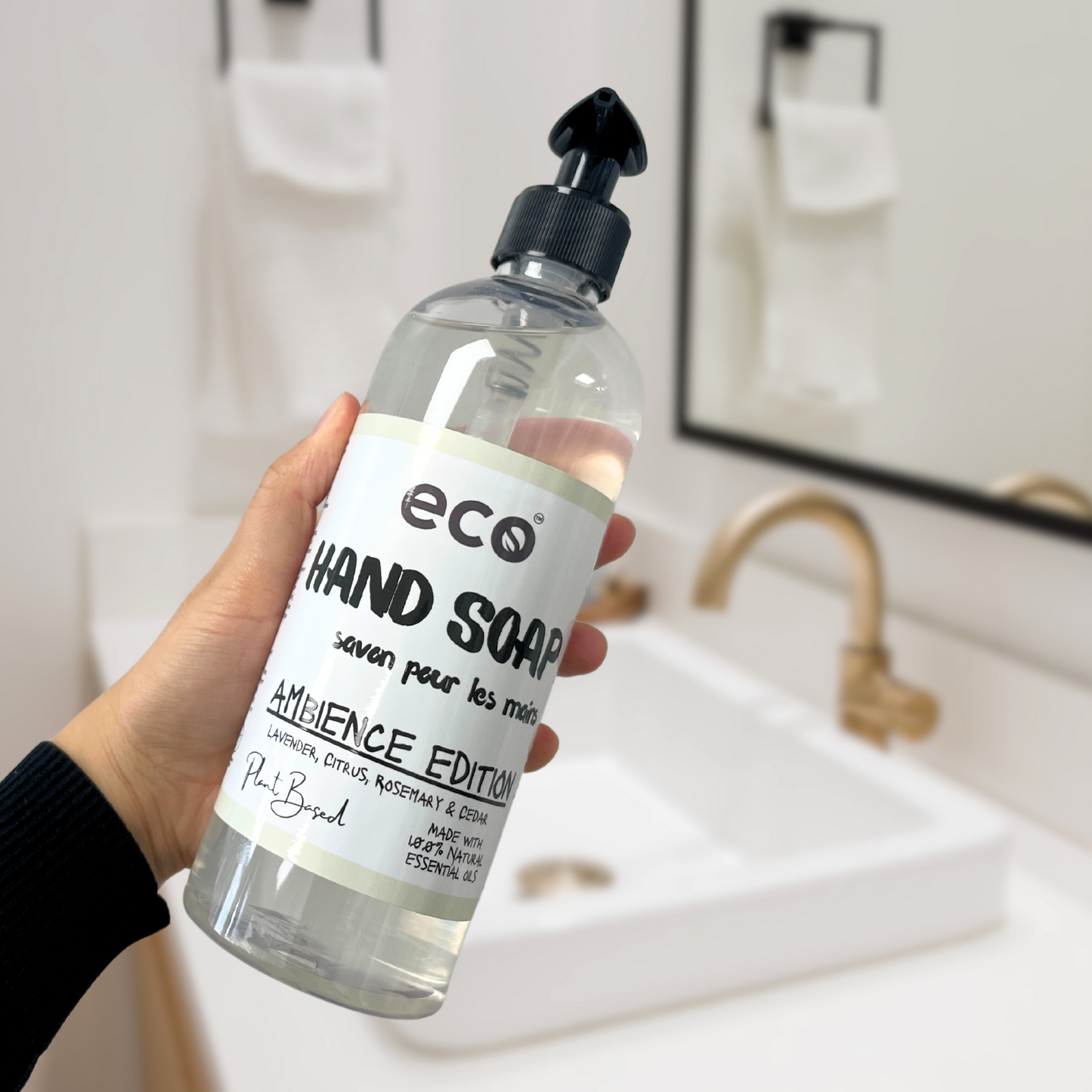 Eco-friendly hand soap bottle in a washroom, promoting a plant-based and sustainable home.