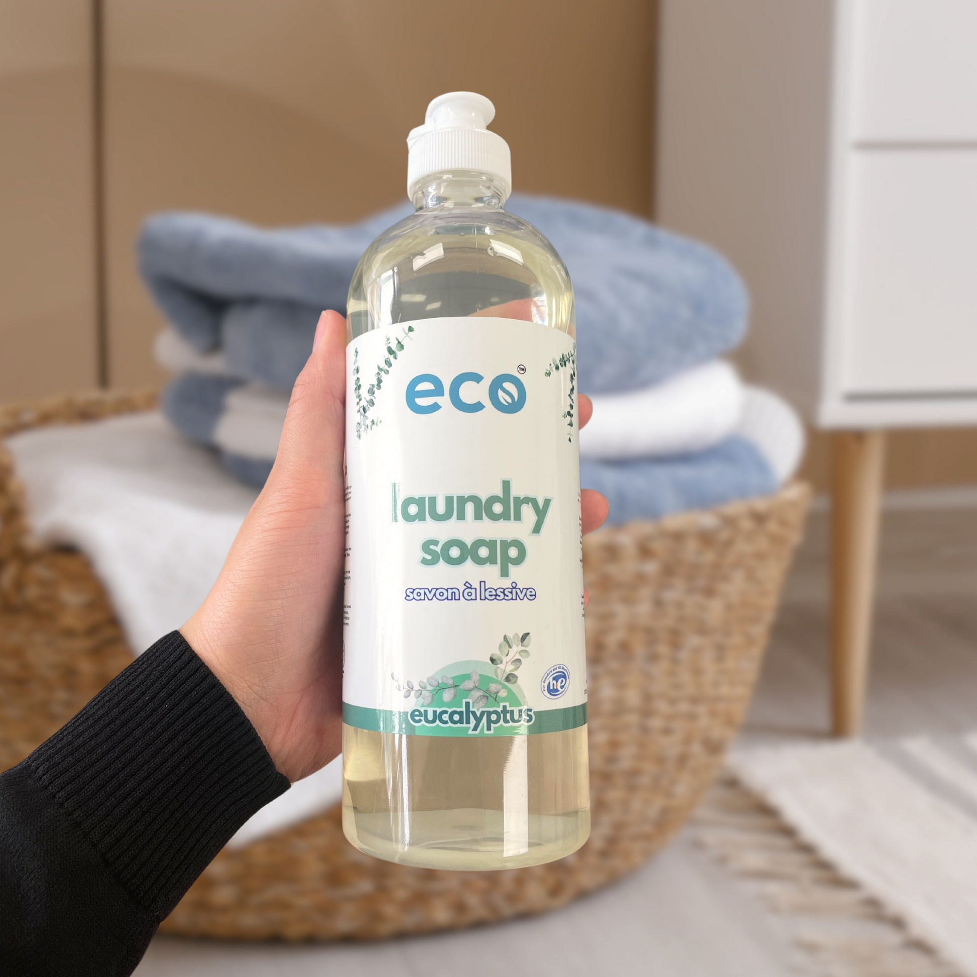 A bottle of eco laundry soap in eucalyptus, for a plant-based and eco-friendly laundry routine.